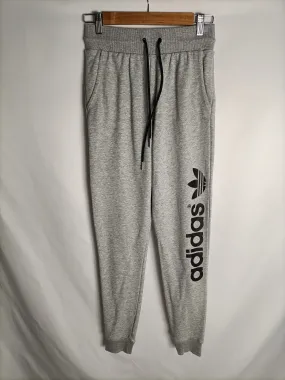 ADIDAS. Pantalón elástico gris T.34
