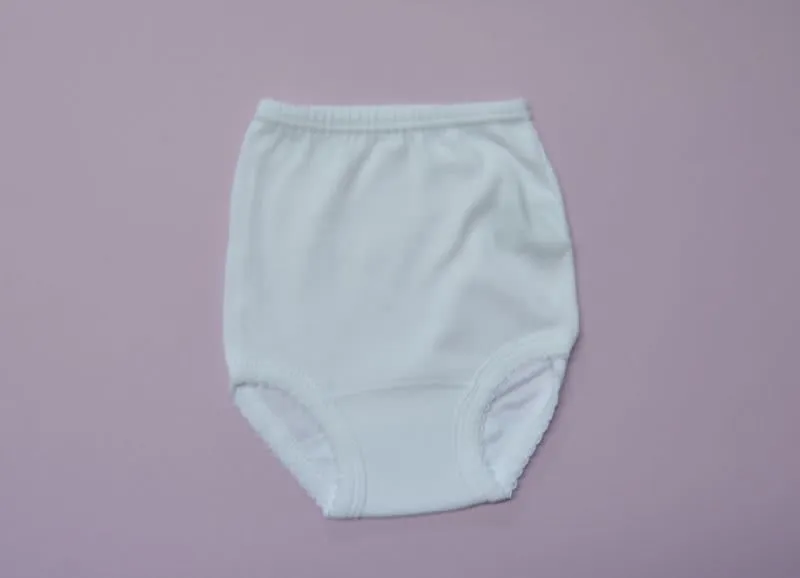 Braguita cubrepañal blanca para niña. 3 y 6 meses